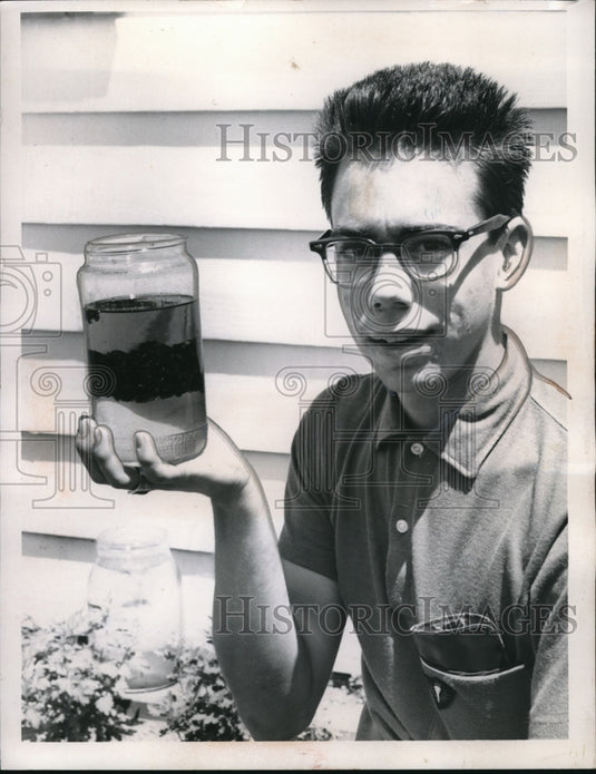 1960 Press Photo Terry Dobro & jar of Japanese beetles & gas to kill them - Historic Images