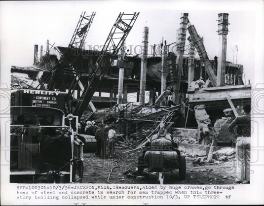 1956 Jackson Mich crans at building that collapsed under constructio - Historic Images