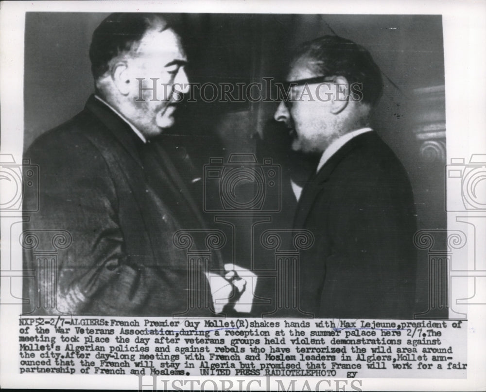 1956 Press Photo Guy Mollet shakes hands with Max Lejeune, President of War Vets - Historic Images