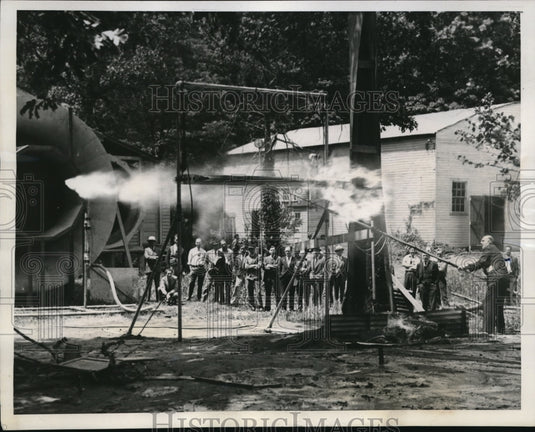1941 Press Photo Natl Bureau of Standards dump gas tanks in a demonstration - Historic Images