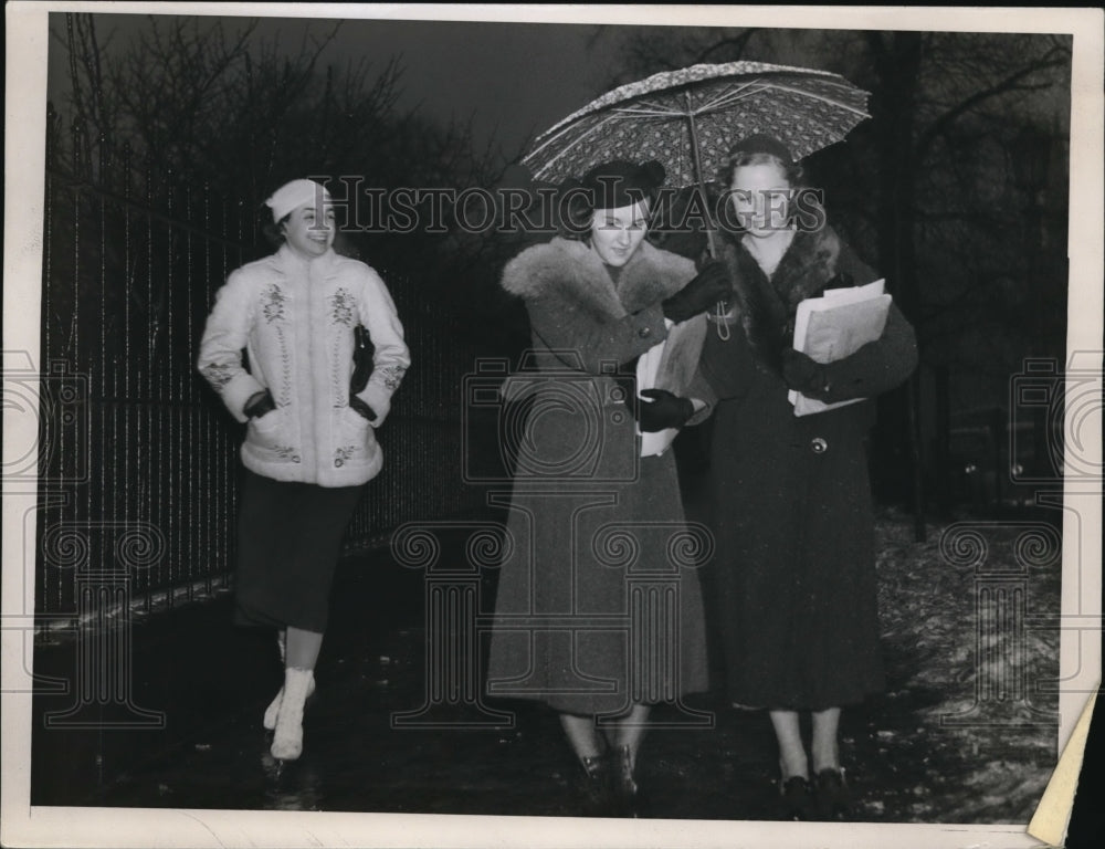 1937 Press Photo Some women stroll on a street in winter coats - nec95420 - Historic Images