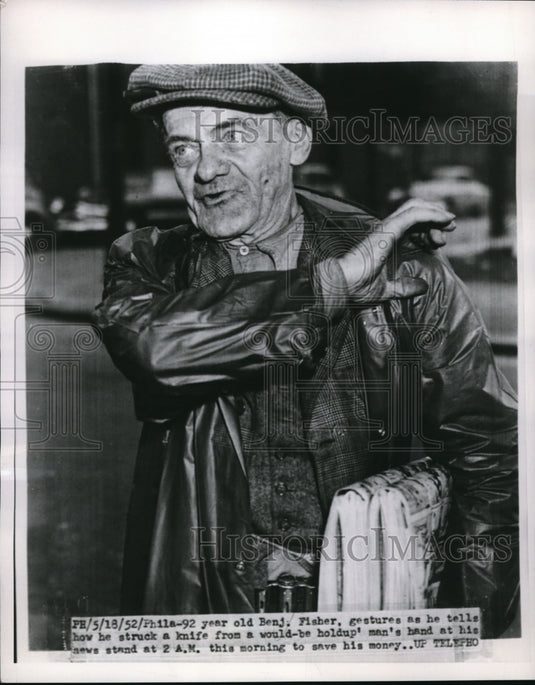 1952 Benjamin Fisher shows how he took a knife from a would be thief - Historic Images