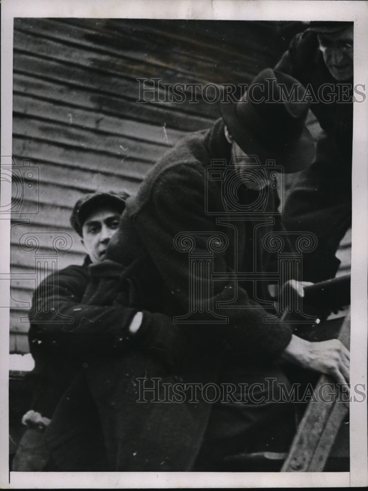 1937 85 Year old man rescued from flood that isolated him in Ohio - Historic Images