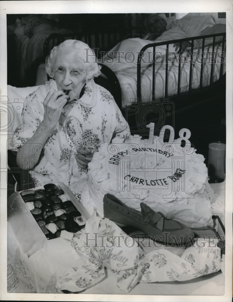 1958 Press Photo Mrs. Charlotte Bonner celebrates 100th birthday with sweets - Historic Images