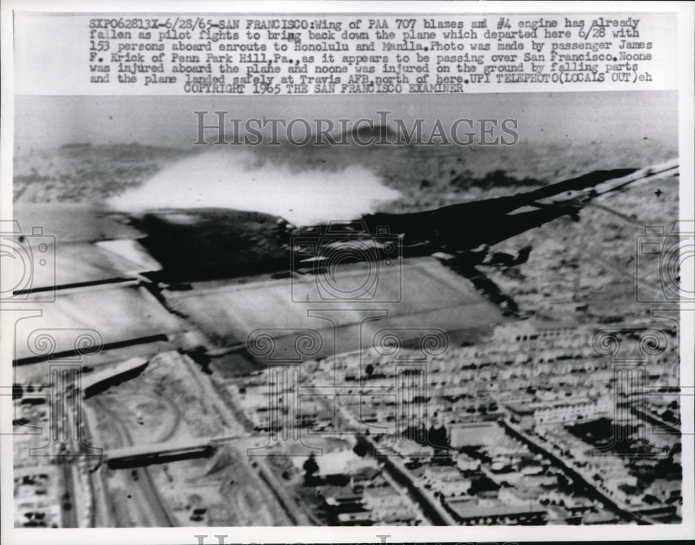 1965 Press Photo View of the Wing of a PAA 707 as it engulfed in flames - Historic Images