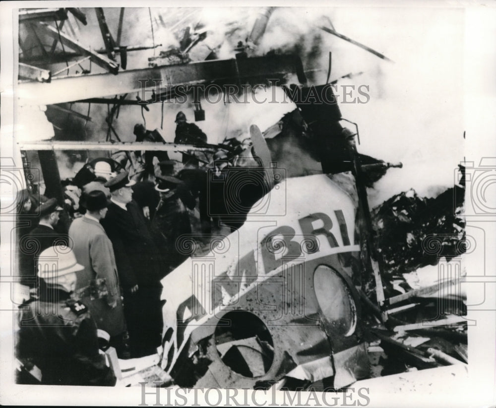 1965 Press Photo Firemen battling fire of wrecked Cambrian Airlines Aircraft - Historic Images