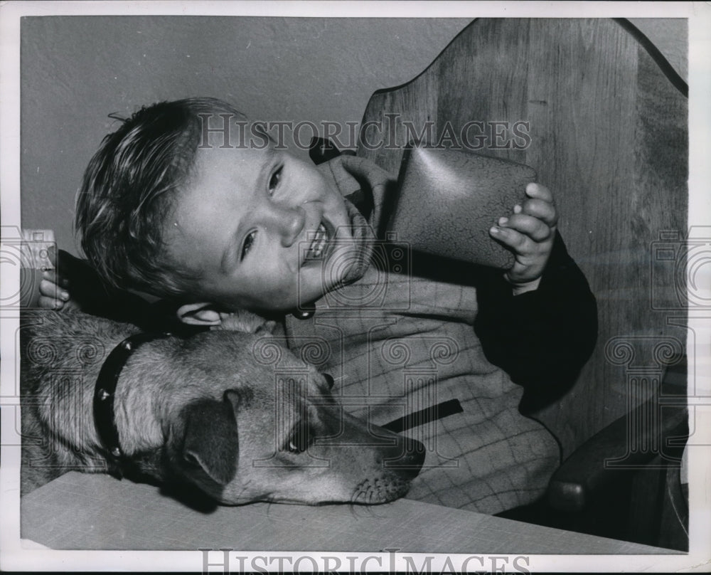 1956 Press Photo W. Loar gives his dog, Whiskers a hug after it was awarded - Historic Images