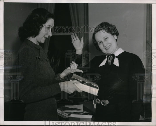 1937 Press Photo Young Lady vows that she will eat no weight increasing sweets. - Historic Images