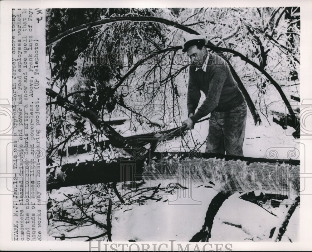 1953 Press Photo Newark NJ workers clear trees downed by ice storm - nec95864 - Historic Images