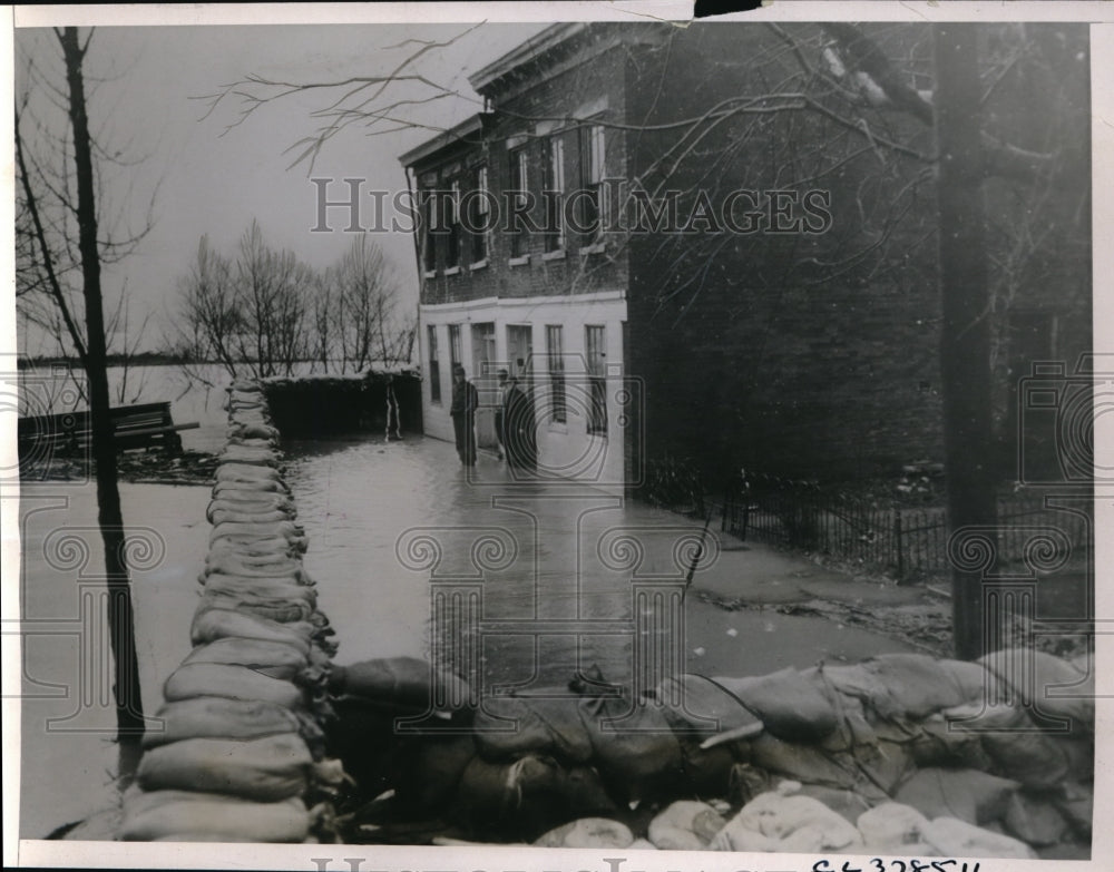 1937 Useless sand bags in Portsmouth flood - Historic Images