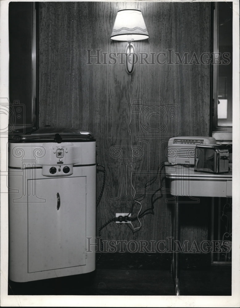 1947 A view of a overloaded electric socket at a home - Historic Images