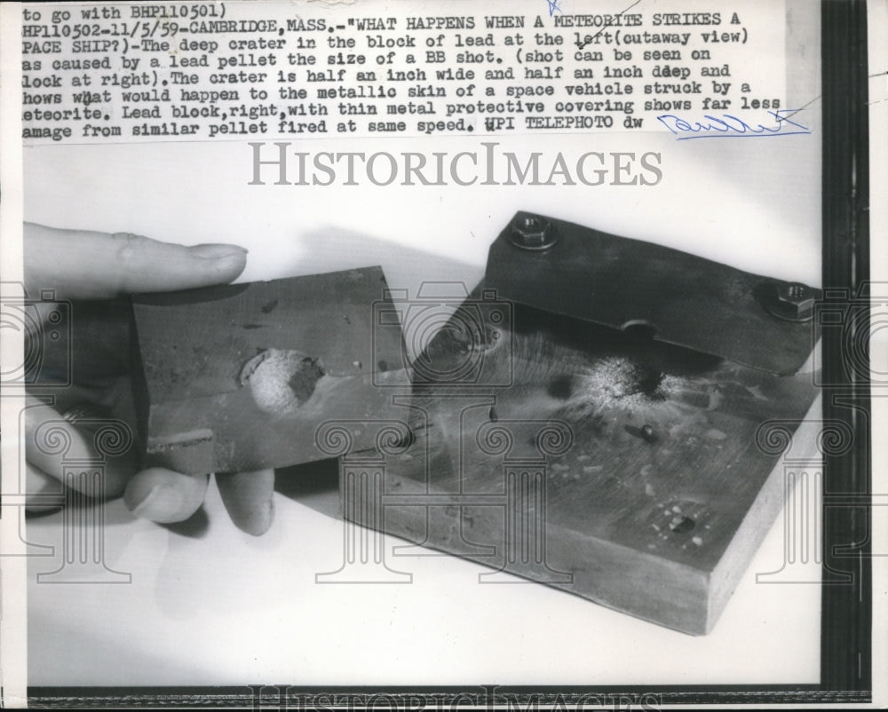 1959 Press Photo Crater in the block lead caused by lead pellet - Historic Images