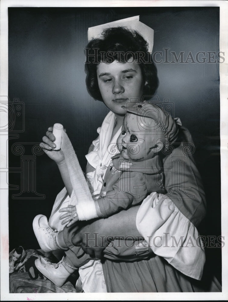 1961 Press Photo Margaret Haderski with a Doll - nec96721 - Historic Images