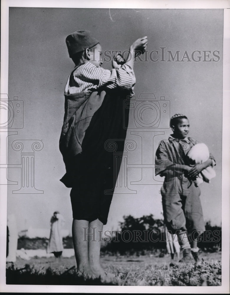 Press Photo Happy French Morocco kids playing outside the house - Historic Images