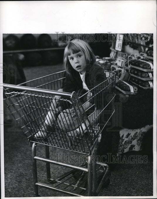 1956 Press Photo A Young Blonde Substitutes Fruits & Vegetables For The Doll - Historic Images