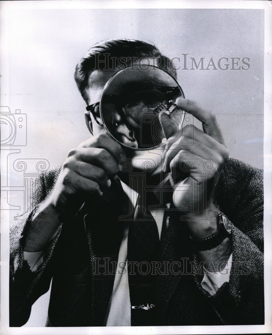 1956 Press Photo Dr. T.O. of General Electric examines a Revolutionary Magnet. - Historic Images