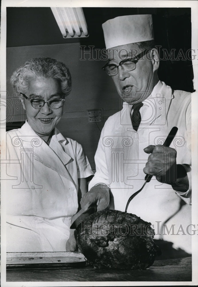 1967 Press Photo Mr and Mrs Frank Tanaka with some meat they cooked - Historic Images