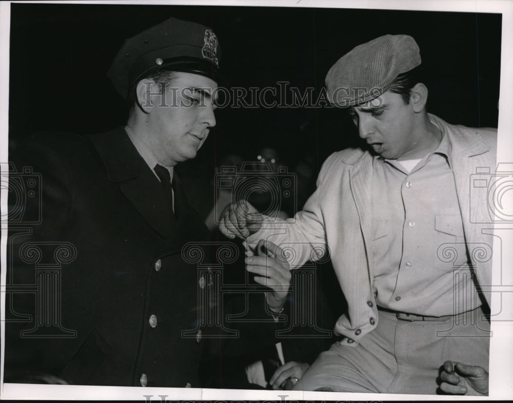 1959 Press Photo Chicago Police eject protesting fan Alex Masciola - nec98798 - Historic Images