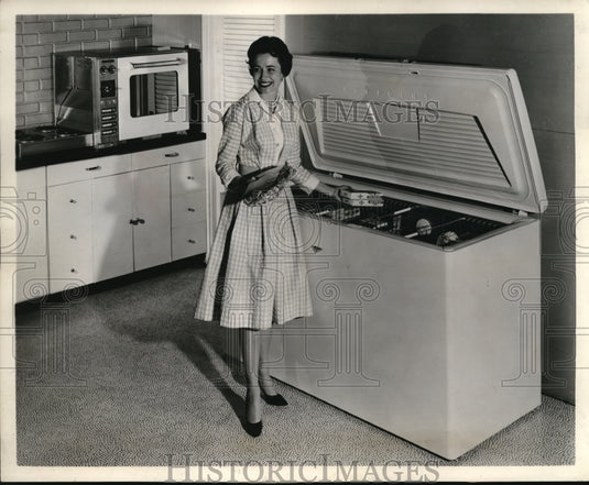 1961 Press Photo Introducing the new 20 cu ft. freezer lets you save more - Historic Images