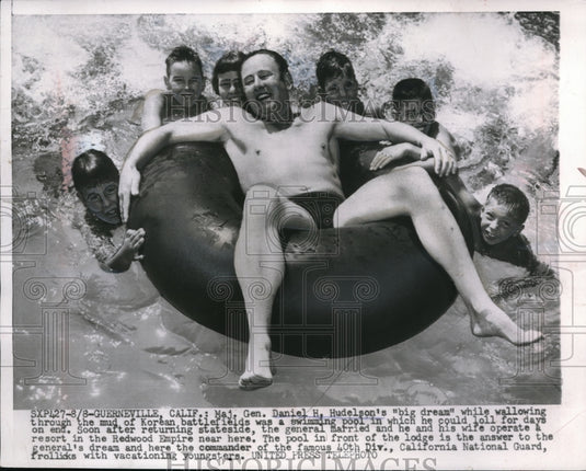 1954 Press Photo Maj. Gen. Hudelson swimming in a pool in front of the lodge. - Historic Images
