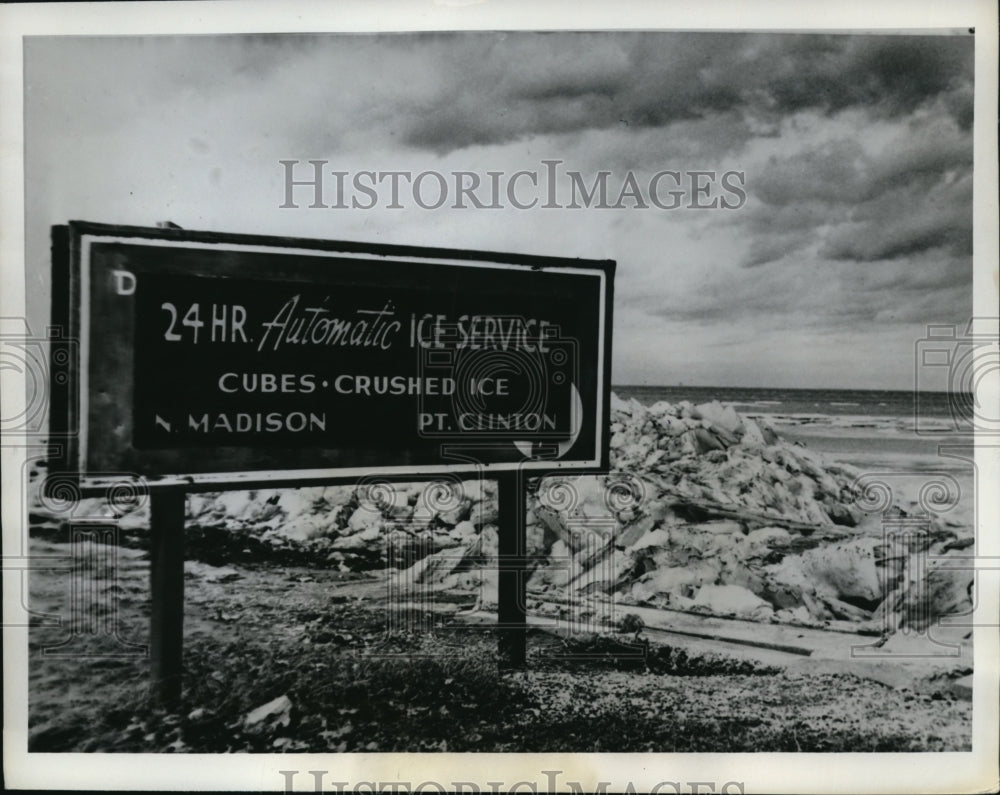 1962 Press Photo Sign Advertises Ice Service at Ice Covered Pt Clinton Ohio - Historic Images