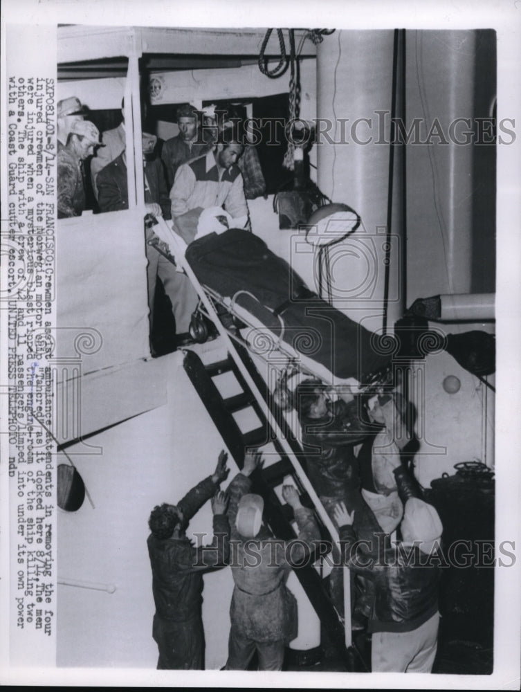 1955 Press Photo Removing the four injured crewman off the Norwegian &quot;Tancred&quot; - Historic Images