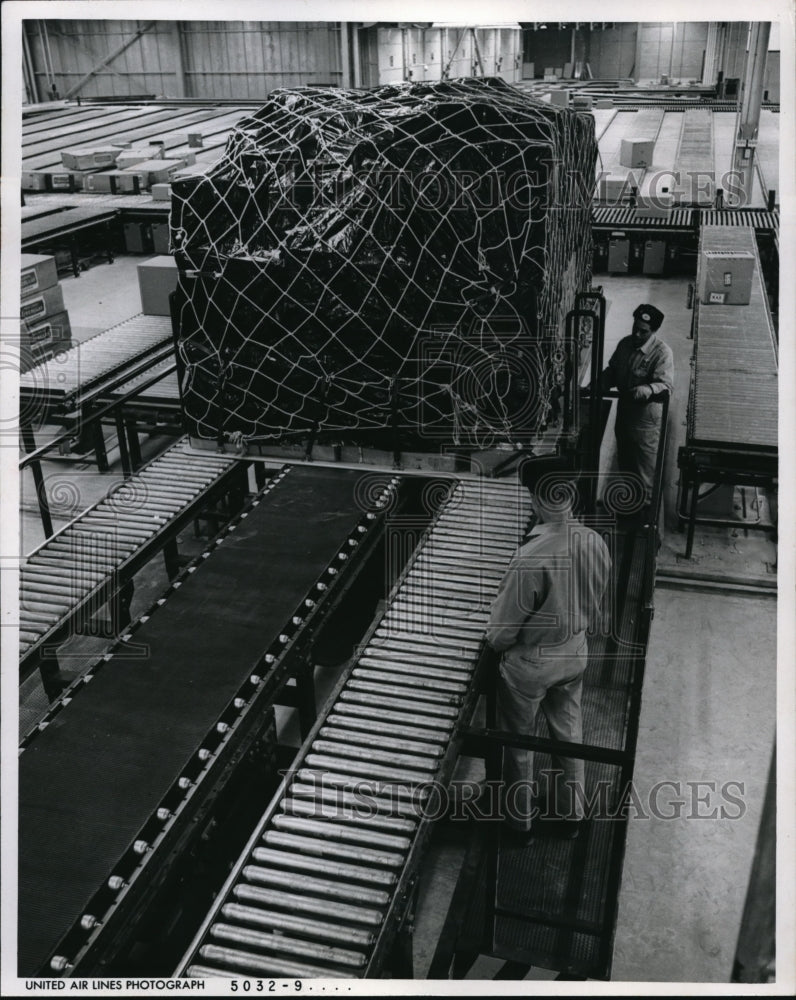 1966 Press Photo Loaded pallet transferred to staging area in United Air Lines-Historic Images