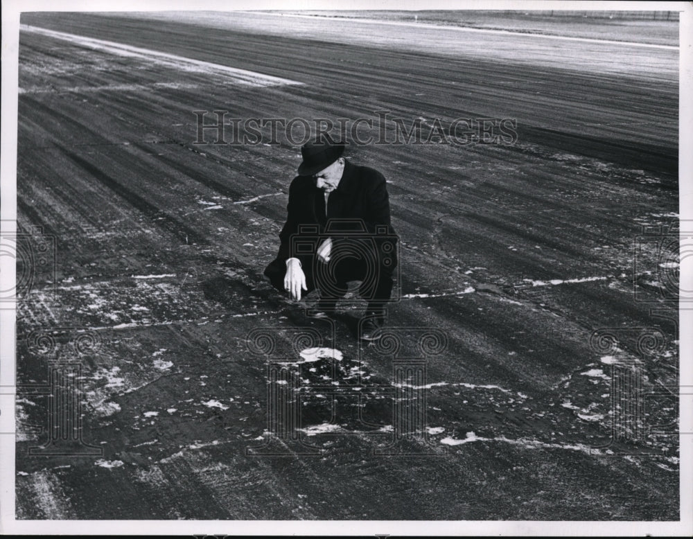 1965 Press Photo William Leckrone Checks Runway of Cleveland Hopkins Airport-Historic Images