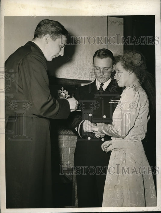 1943 Ensign Walter T. Sittman as he receives a medal for heroism - Historic Images