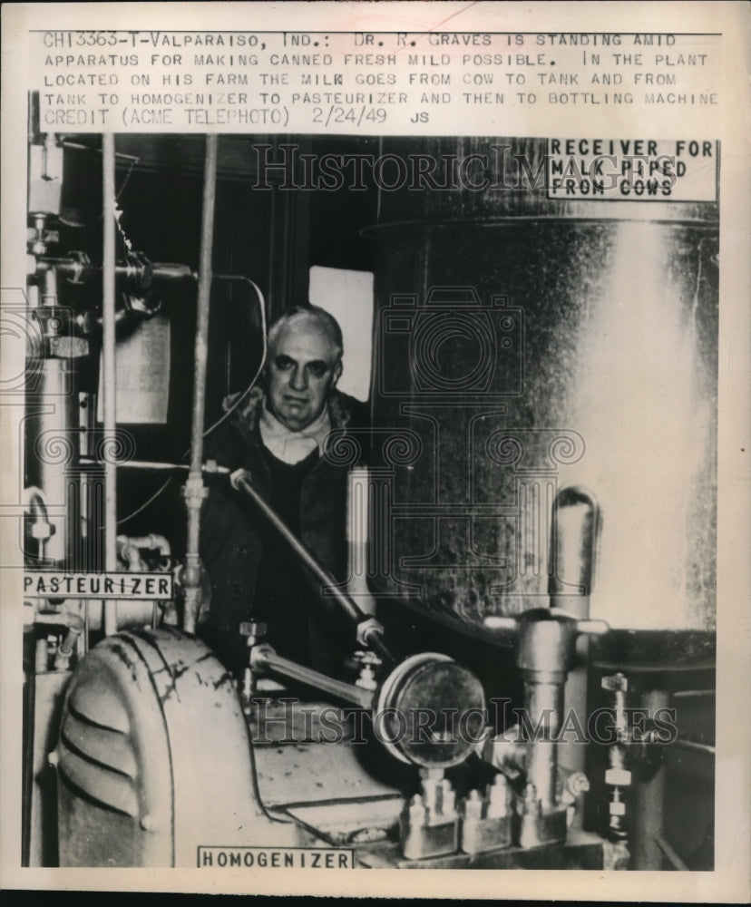 1949 Press Photo Man Displaying Milk Canning Apparatus - Historic Images