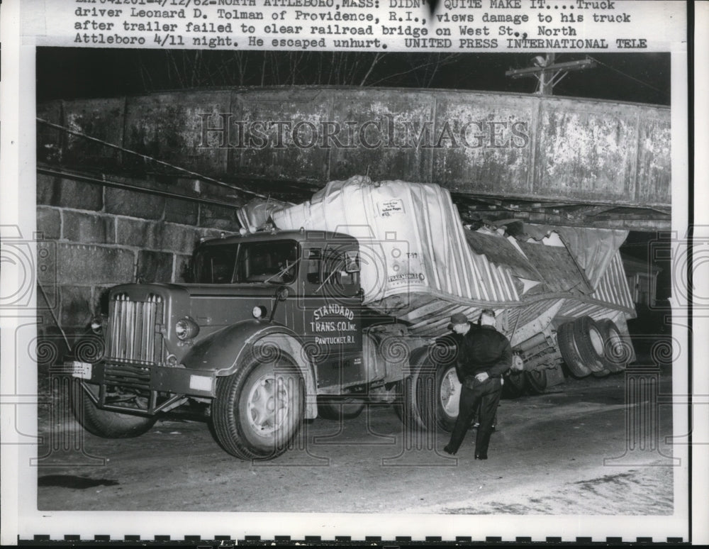 1961 Press Photo North Attleboro Mass truck driver Leonard D Tolman views damage - Historic Images