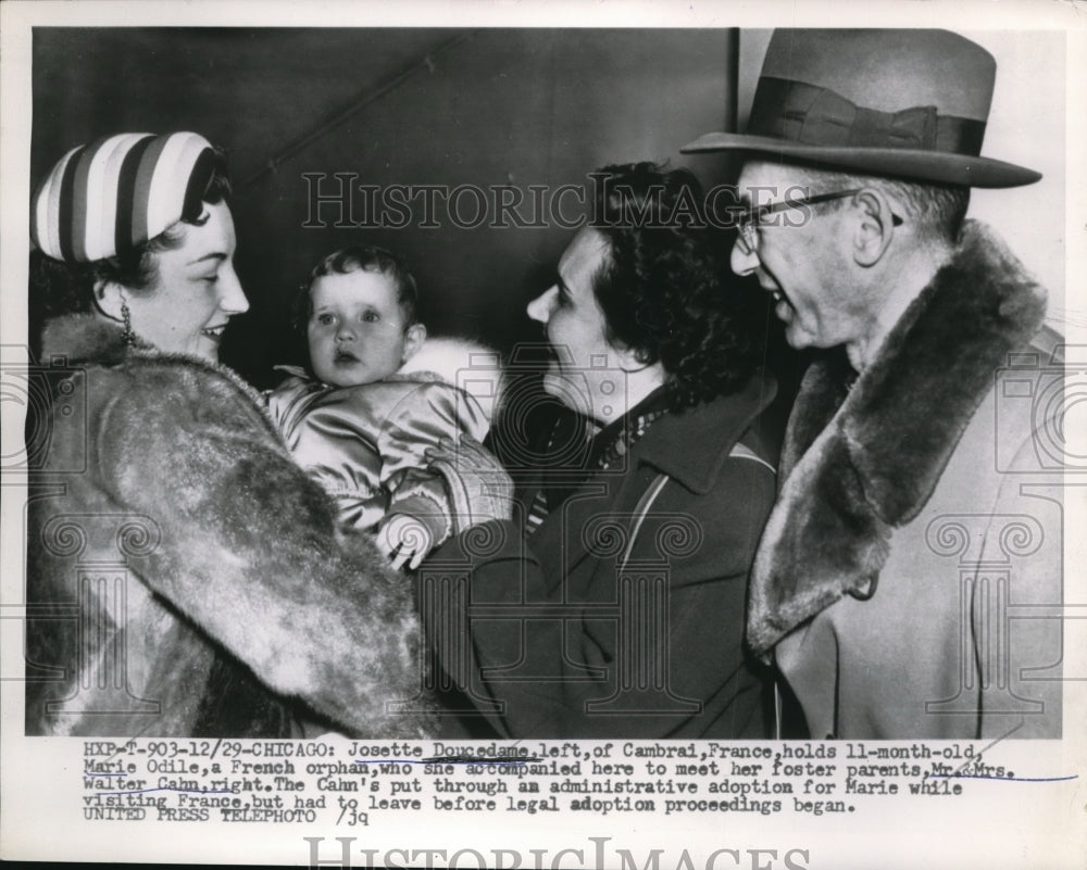 1955 Press Photo Josette Doucedame introduces baby to foster parents - ned14698-Historic Images