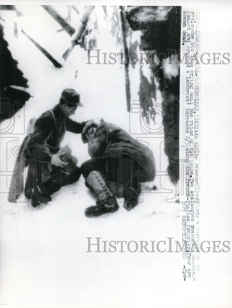 1961 Press Photo Rescuer Comforts Avalanche Survivor in Rochemolles Italy - Historic Images