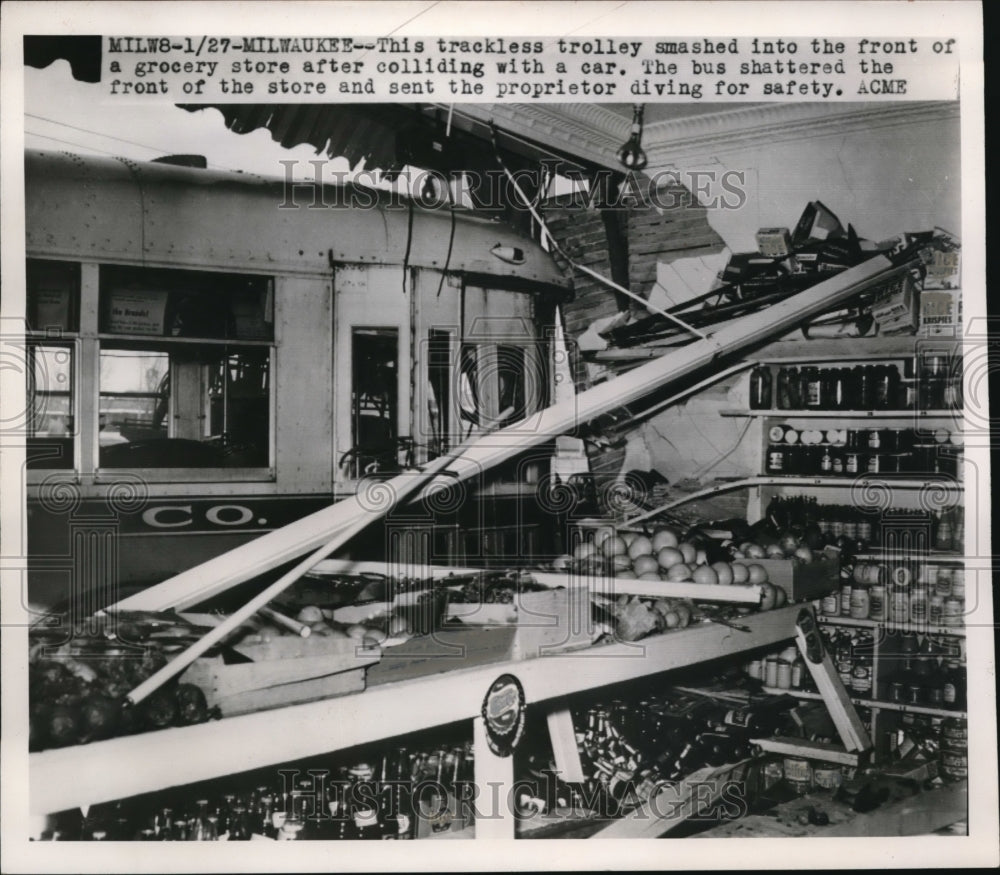 1950 Trackless Trolley smashes into grocery store after collision - Historic Images