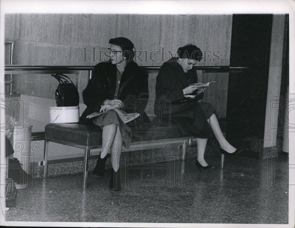 1960 Ladies waiting for plane at Hopkins Airport - Historic Images