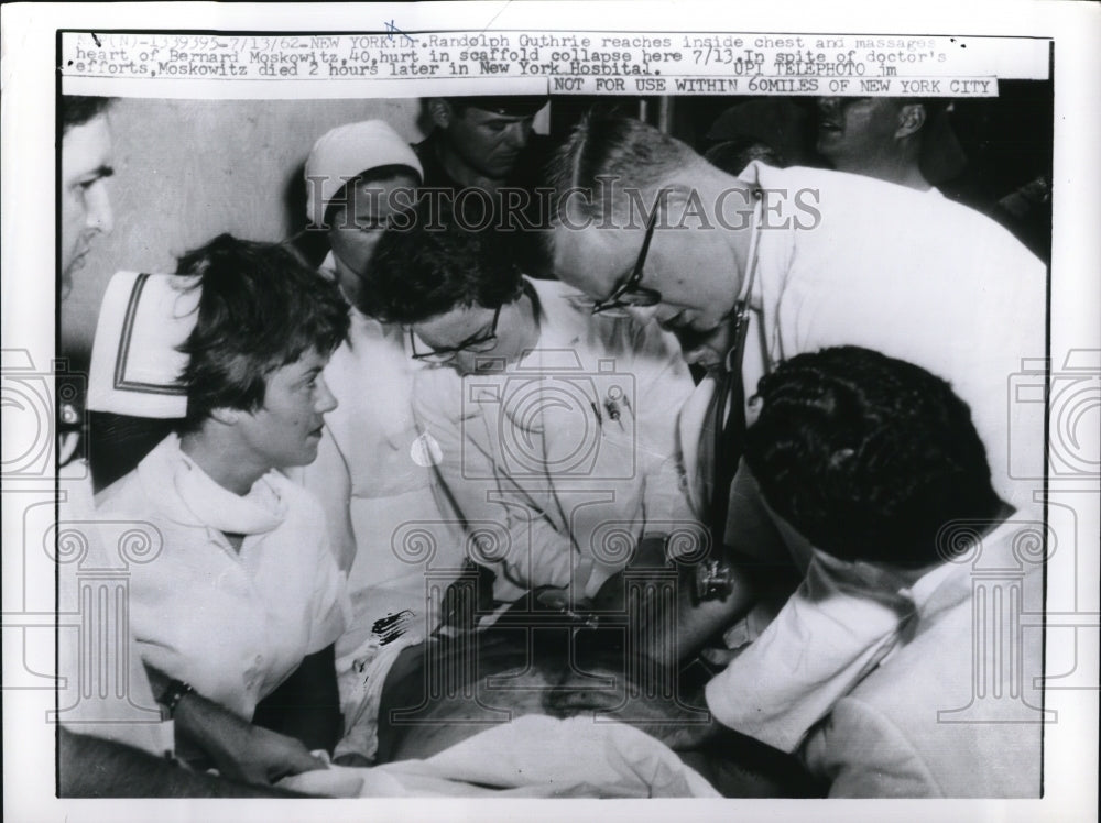 1962 Press Photo Dr Randolph Guthrie reaches for Bernard Moskowitz&#39;s heart - Historic Images