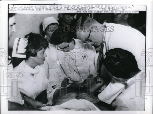 1962 Press Photo Dr Randolph Guthrie reaches for Bernard Moskowitz's heart - Historic Images