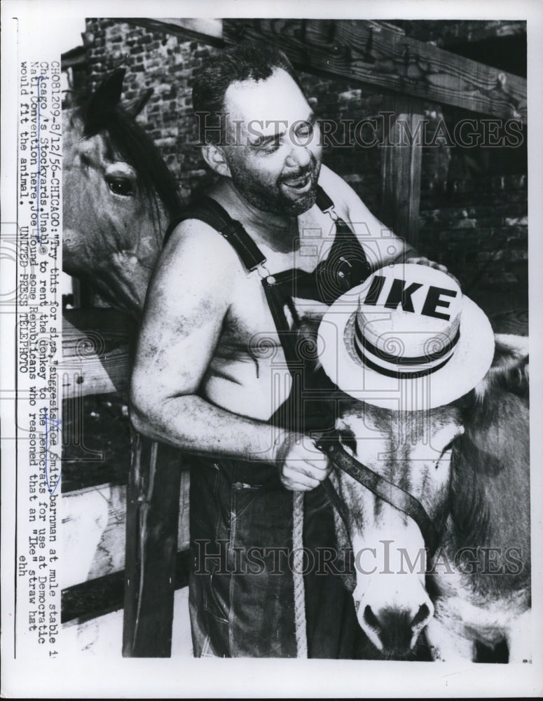 1956 Press Photo Joe Smith, barnman with the Donkey wearing &quot;Ike&quot; straw hat - Historic Images