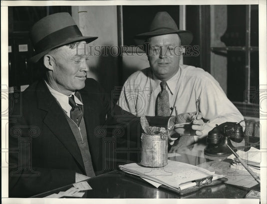 1934 Press Photo Deputy Sheriff William Levy and Joe B. Maier - Historic Images
