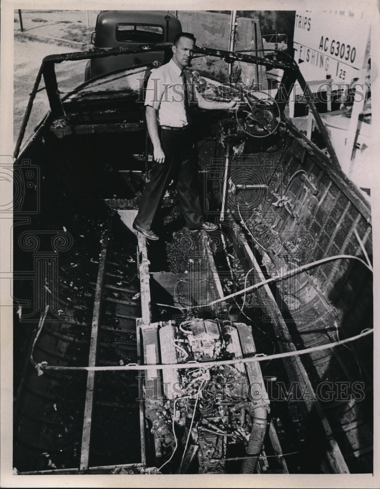 1966 Press Photo Lawrence McQuade, boat burning - Historic Images