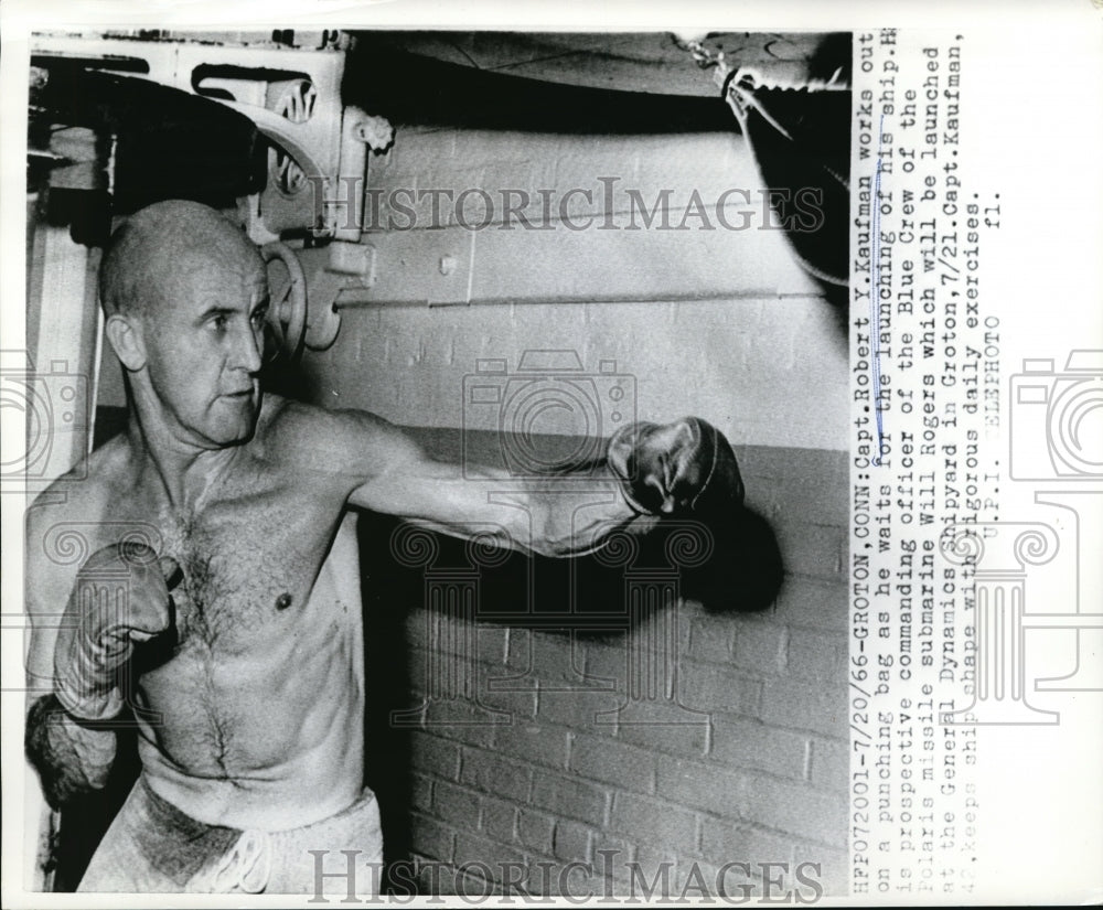 1966 Press Photo Capt. Robert Y. Kaufman works out on punching - Historic Images
