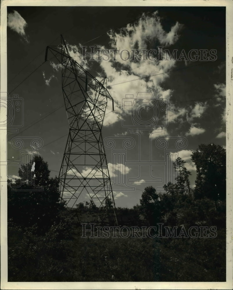 1944 Press Photo The tall steel tower shown here is supporting a section of one-Historic Images