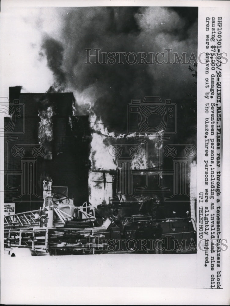 1958 Press Photo Flames roar through a tenement business block - Historic Images