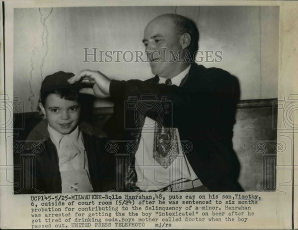 Timothy Rollo 1954 Press Photo Rollo Hanrahan pitting cap on his son, Timothy ...
