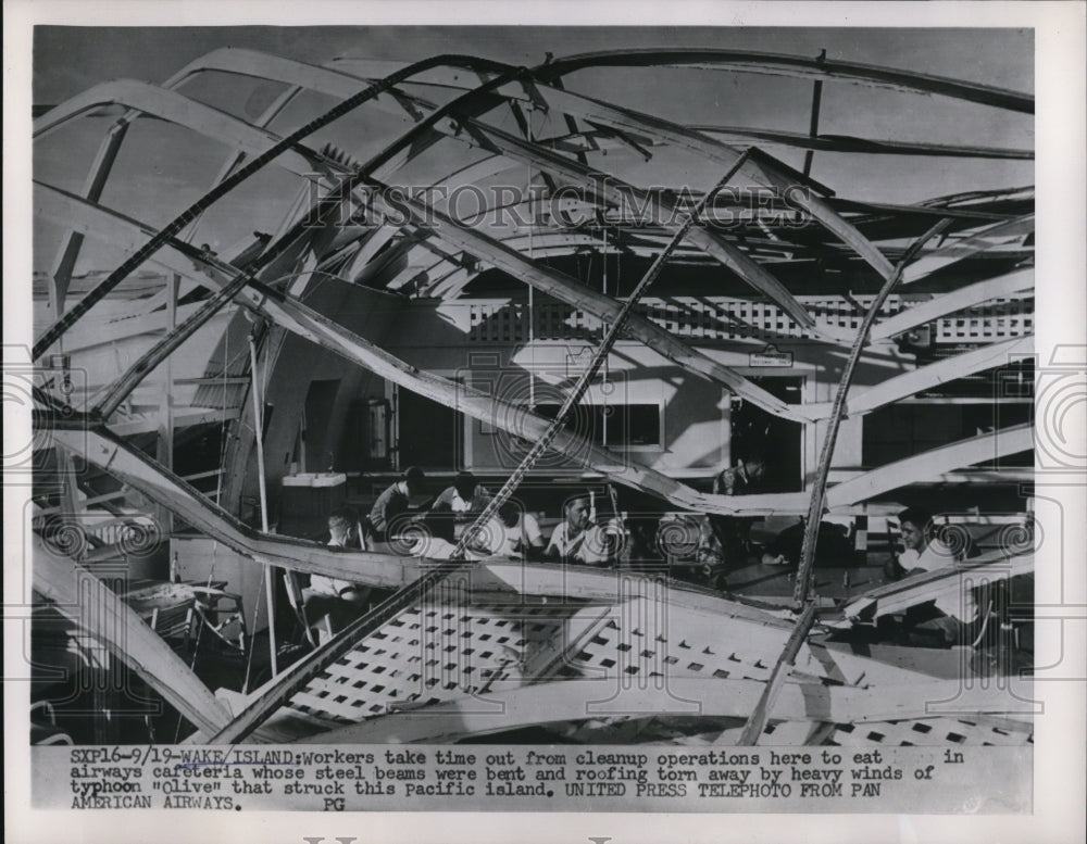 1952 Press Photo Cleanup Workers During Break After Wake Island Typhoon Olive - Historic Images
