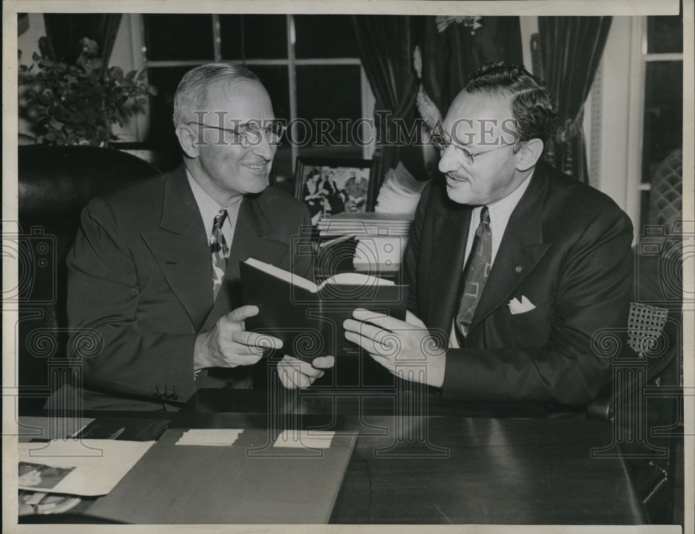 1945 President Truman received Fighting for America from Frank Weil-Historic Images