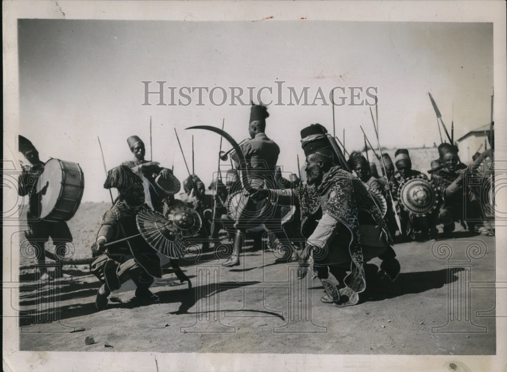 1935 on a recent visit to Askari camp in East Africa Ray Rousseau-Historic Images