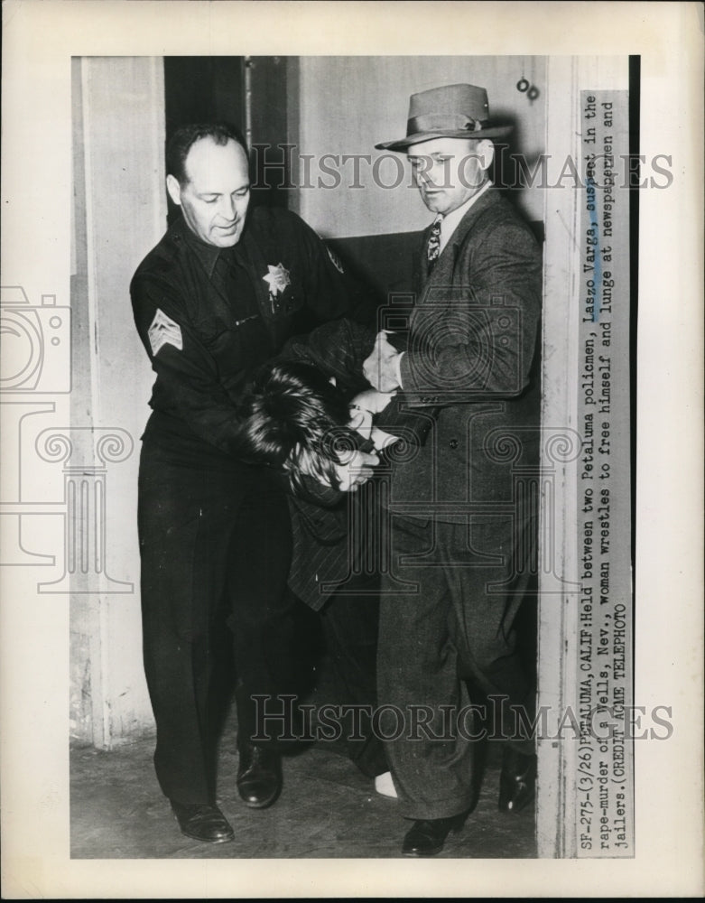 1948 Press Photo Laszo Varga suspect in rape-murder wrestles to free himself - Historic Images