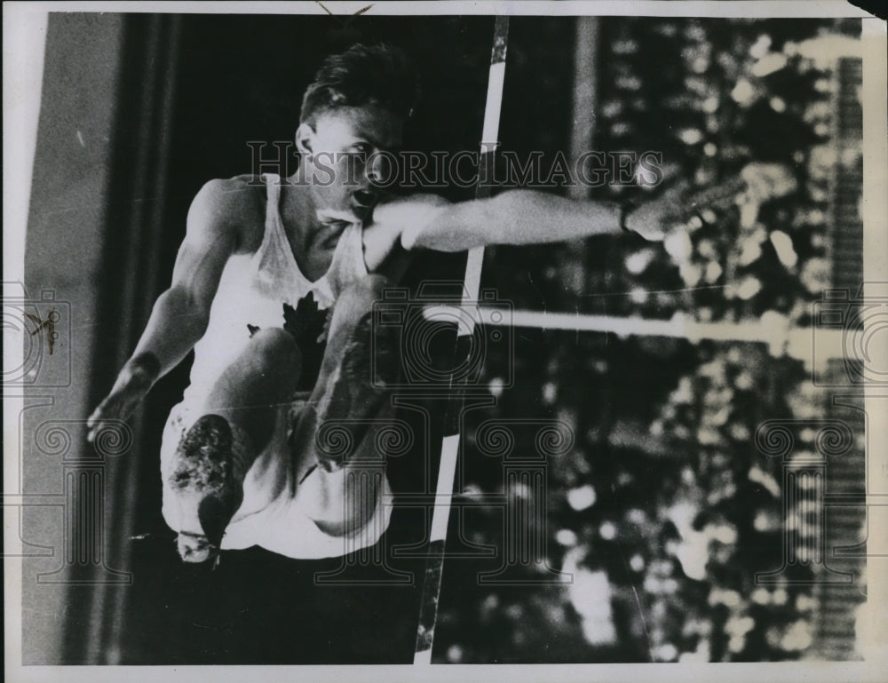 1934 Press Photo R Jansen of Canada in high jump at Inter Empire games - Historic Images