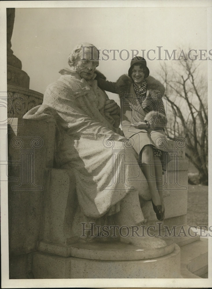 1930 May Alexander, in strong arms of John Erickson Statue at Wash.-Historic Images
